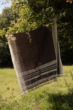 Handwoven woolen shawl/ throw from the Kutch district of Gujarat, India.  These are ideal to keep you warm in winter or as an attractive throw for a sofa or bed. They are beautifully handspun and handwoven. The yarn is undyed so the color is completely natural; The attractive browns and creams are the colour of the sheep's wool. These are sustainable, organic and natural and have been personally and ethically sourced.  size and shade can vary slightly from piece to piece  99cm X 229cm (including Woolen Shawl, Indian Textiles, Natural Colours, Wool Shawl, Vintage Textiles, Sheep Wool, Natural Dyes, Shawls And Wraps, Yarn Dyeing