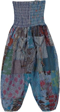 A stonewashed harem style patchwork pants in a blue tone and various fascinating prints. These soft cotton pull-on pants feature a smocking elastic waist, two functional front pockets with wooden-bead-closing buttons and elastic bottom. #tlb #SplitSkirtsPants #Patchwork #bohemianfashion #Handmade #GirlsHippiePants #CountryPants #PatchworkPants Casual Blue Bottoms With Floral Patchwork, Hippie Blue Patchwork Bottoms, Bohemian Blue Bottoms With Floral Patchwork, Blue Cotton Patchwork Harem Pants, Blue Hippie Harem Pants For Spring, Blue Hippie Harem Pants With Elastic Waistband, Baggy Blue Harem Pants With Elastic Waistband, Blue Baggy Harem Pants With Elastic Waistband, Blue Hippie Harem Pants With Pockets