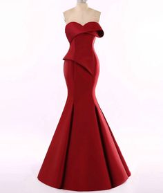 This red strapless evening gown from #DallasTexas #Designer can be made in any color or with any design changes you need. When the garment is being made to order you can request any fabric you prefer as well. We have many other evening #gowns in our collection that you can consider on our main website. Contact us directly for more info on our process and how we work with long distance clients all over the globe. Red Strapless Evening Dress With Sweep Train, Strapless Red Evening Dress With Sweep Train, Red Strapless Floor-length Dress With Fitted Bodice, Red Strapless Dress With Fitted Bodice, Floor-length, Elegant Red Strapless Ball Gown, Red Strapless Ball Gown With Fitted Bodice, Red Strapless Gown With Fitted Bodice, Red Haute Couture, Couture Evening Gowns