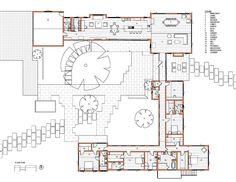 the floor plan for a house with an open living room and dining area in it