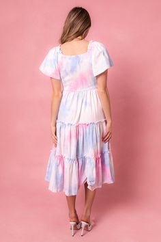 This magical dress is packed with the most whimsical details --- a flowy skirt, super soft 100% cotton, smocked bodice, and a subtle square neck-line that doesn't sacrifice coverage. Perfect for gender reveals, parties and just because. Flowy Smocked Midi Dress With Square Neck, Flowy Smocked Dress With Bodice And Square Neck, Flowy Smocked Dress With Square Neck And Smocked Bodice, Square Neck Smocked Sundress With Ruffles, Playful Pink Dress With Smocked Back, Tiered Cotton Smocked Dress With Ruched Detail, Flowy Smock Dress With Square Neck, Flowy Smocked Dress With Square Neck And Ruffles, Cotton Smocked Dress With Tiered Skirt For Summer