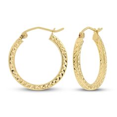 These beautiful hoop earrings for her are crafted in iconic 14K yellow gold and showcase a beautiful diamond cut finish. The textured hoops measure 20mm and secure with hinged clasps. 14k Gold Small Hoop Hinged Jewelry, Small Hoop Hinged 14k Gold Jewelry, Small Hoop Diamond Cut 14k Gold Huggie Earrings, 14k Gold Hinged Huggie Hoop Earrings, Yellow Gold Hoop Jewelry With Diamond Cut, Yellow Gold Hoop Earrings With Diamond Cut, Anniversary Hinged Huggie Hoop Earrings, Textured 14k Yellow Gold Jewelry, Anniversary Yellow Gold Hinged Hoop Earrings