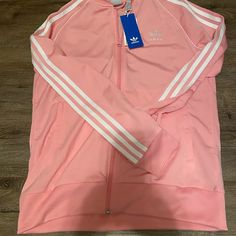 Gorgeous New With Tag Bubble Gum Pink Adidas Track Jacket With White Three Stripes. Youth Size Large. Matching Pants In Youth Size Medium Also For Sale In My Closet! Please Ask Any Questions. No Returns. Thank You! White Long Sleeve Track Jacket For Spring, Trendy White Track Jacket For Winter, Pink Adidas Sports Outerwear, Pink Adidas Sporty Outerwear, Adidas White Outerwear For Spring, White Adidas Outerwear For Spring, White Fitted Adidas Outerwear, Sporty Pink Adidas Outerwear, Fitted White Adidas Outerwear