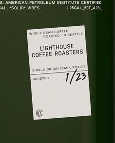 there is a label on the side of a coffee machine that says lighthouse coffee roasters