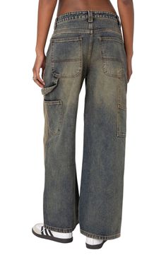 These washed, nonstretch-denim jeans are rendered in a low-rise baggy fit that serves up serious retro flair. Zip fly with button closure Front scoop pockets; back patch pockets; side cargo pockets 100% cotton Machine wash, dry flat Imported Low Rise Baggy Jeans, Swimwear Dress, Washed Denim, Nordstrom Store, Low Iron, Washed Jeans, Back Patch, Baggy Fits, Baggy Jeans