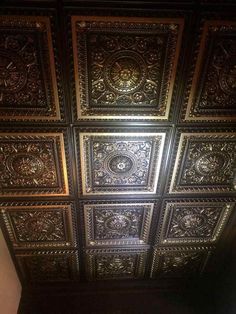 the ceiling is made up of metal tiles