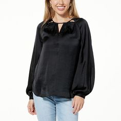 DG2 by Diane Gilman Cutout V-Neck Satin Hi-Low Hem Blouse  Simple & chic, this satin long-sleeve blouse is the perfect pick for that stylish office look. Pair with trousers and heels for a full look, or with denim for a more casual outfit. Chic Split Neck Top For Brunch, Black Split Neck Top For Workwear, Chic Solid Color Split Neck Blouse, Chic Solid Split Neck Blouse, Chic Split Neck V-neck Top For Work, Chic Split Neck Blouse For Spring, Chic Black Split Neck Top, Chic Long Sleeve V-neck Top, Chic Solid Color Split Neck Tops