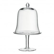 a glass bell on a stand with a white background