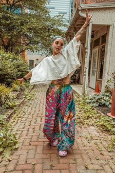 The hippie tie dye flowy pants you've been searching for! These pants are ultra flowy, flattering and beautiful! Available in several beautiful colors each is one of a kind, unique and completely hand tied and dyed, so each pattern will be unique and one of a kind.  Regular fits waists 24"-44" (XS-XL) PLUS fits waists 42"-60" (2X-4/5X) Super flowy bohemian style fits perfect for yoga, your next festival or grocery store runs! Hippy Yoga Outfit, Cheap Beachwear Bottoms For Festival, Cheap Bohemian Harem Pants For Summer, Boho Pants Fall, Cheap Wide Leg Summer Flares, Cheap Bohemian Wide Leg Pants For Summer, Cheap Bohemian Summer Wide Leg Pants, Festive Bohemian Sets, Cheap Tie Dye Bottoms For Spring