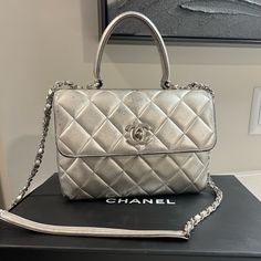 Items Is Only 3 Years Old But With The Metallic It Comes Off Easily . Chanel Doesn’t Repair Any Metallic Bags And This Is Something That’s Common With All The Metallic Bags Made Of This Leather Condition Is Shown In Photos Silver Chanel Bag, Shopping Shoulder Bag With Silver-tone Hardware, Chanel Mini Flap Bag Silver, Silver Tote Shoulder Bag With Silver-tone Hardware, Chanel Metallic Silver Bag, Metallic Bag, Flap Bag, Chanel Bag, Bag Making