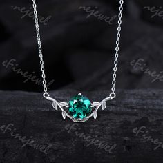 8mm round lab emerald pendant necklace leaf vine green crystal necklace May birthstone dainty handmade proposal gifts for women gift for mom Product Specifications: 8mm round lab emerald  Chain: 16-18 Inches.  Metal: silver, 14K Or 18K Soild Gold (White, Yellow, Rose)   -See more Engagement rings -You can click on the link www.etsy.com/shop/eFinejewel?section_id=24546904 Ring Size: We can make the ring in any ring size,If the ring size is not in the list,contact us,we'll custom make it for you! Emerald Chain, Green Crystal Necklace, Emerald Pendant Necklace, Emerald Necklace Pendant, Emerald Pendant, May Birthstone, Green Gems, Proposal Gifts, Wedding Jewellery Necklace