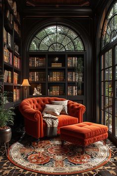 an orange chair and ottoman in a library