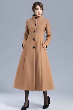 Luxury Single Breasted Pea Coat For Fall, Luxury Winter Pea Coat With Buttons, Luxury Fall Pea Coat With Buttons, Luxury Winter Button-up Pea Coat, Luxury Classic Knee-length Outerwear, Luxury Button-up Pea Coat For Winter, Luxury Casual Long Sleeve Pea Coat, Luxury Long Coat Peacoat For Business, Luxury Long Pea Coat For Work