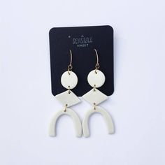 PORCELAIN MOTHERWELL EARRINGS - White by asensiblehabit Artsy White Everyday Jewelry, Handmade White Artsy Earrings, Artsy White Drop Earrings, Handmade White Earrings For Everyday, White Artsy Drop Earrings, White Handmade Earrings For Everyday Wear, Artsy White Jewelry For Gifts, Artsy White Earrings, Artistic White Drop Earrings