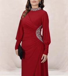 Made of polyester blend woven fabric. It is a lined dress. Dress length is 172 cm. Traditional Long Sleeve Gown For Banquet, Festive Evening Dress With Long Sleeves And Fitted Bodice, Festive Long Sleeve Evening Dress With Fitted Bodice, Traditional Long Sleeve Formal Evening Dress, Traditional Long Sleeve Evening Dress, Elegant Long Sleeve Maxi Dress With Modesty Panel, Elegant Fitted Maxi Dress With Modesty Panel, Traditional Long Sleeve Fitted Evening Dress, Long Sleeve Red Gown For Eid