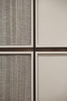 four white cupboards with different patterns on them