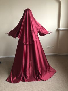 Wonderful long dress made by silk satin and embroidery lace. So elegant and modest burgundy color and chic design make this dress incredible. Widely long sleeves with high cuffs and beautiful buttons. This outfit really unique and amazing! Standard length of dress 150 cm, I can make any length and size, please contact me. Modest Long Sleeve Khimar For Wedding, Modest Long Sleeve Wedding Khimar, Maxi Length Khimar For Wedding, Modest Wedding Niqab For Eid, Silk Long Sleeve Eid Gown, Long Sleeve Silk Gown For Eid, Eid Long Sleeve Silk Gown, Elegant Floor-length Khimar For Wedding, Elegant Red Long Sleeve Abaya