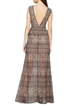 Detailed with panels of intricately embroidered lace, this stunning empire-waist gown with short sleeves vaunts a plunging neckline and graceful, floor-sweeping hemline. Concealed back zipper closure Fabric: 100% nylon tulle; Fabric 2: 100% polyester mesh; Lining: 91% polyester, 9% spandex Washable Mid-weight, non-stretch fabric Floor-length hemline True to fit Elegant Floor-length Lace Dress For Gala, Floor-length Lace Trim Gown For Gala, Floor-length Lace Dress For Gala, Lace Gown With Fitted Bodice And V-neck, Maxi Length Lace Gown With Sheer Bodice, Sheer Bodice Lace Maxi Gown, Lace Gown With Sheer Bodice In Maxi Length, Lace Gown With Sheer Bodice, Maxi Length, Formal Scalloped Lace Maxi Dress