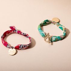 Cute and colorful, make it yours with our Personalized Liberty Bracelet. Choose from a range of feminine floral prints and your favorite merci maman charm, hand-engraved with your own special message.18K Champagne Gold Plated, 925 Sterling Silver or 18K Rose Gold PlatedCharms: 0.8” x 0.8” (heart) and 0.6” x 0.6” (star, disc)Hand-engraved in our Paris workshopSent with love in a complimentary gift boxAny slight variations in lettering depth, spacing and alignment from the examples shown are part Small Aesthetic Gifts, Engraved Bracelet As A Gift For Mom, Engraved Bracelet Gift For Mom, Liberty Bracelet, Bracelets Liberty, Handmade Ceramic Jewelry, Heart Disc, Letter Bracelet, Casual Jewelry