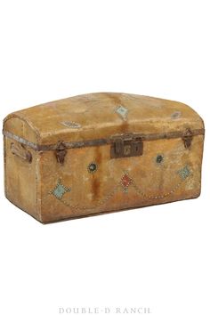 an old, worn suitcase is sitting on a white surface