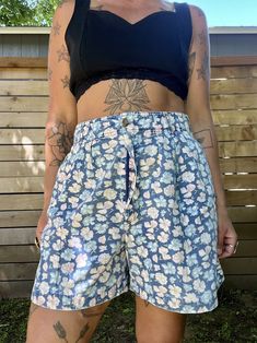 The cutest vintage 1990's floral shorts Faded coloring but still awesome  Side pockets  Zipper button fly  Great vintage condition minus the fading  Tag reads size 14  Measurements taken flat are  Waist: 15.5 in  Hips: 18 in  Rise: 14 in  Length: 18 in long  All sales are final  Thanks for checking out Cereal Vintage Thrift  Recycle Reuse Recreate  Recycle Reuse Recreate Vintage Summer Bottoms With Built-in Shorts, Spring Floral Print Cotton Jean Shorts, Floral Print Jean Shorts For Spring, Casual Cotton Jean Shorts With Floral Print, Spring Floral Print Jean Shorts, Relaxed Fit Floral Print Shorts, Relaxed Fit Floral Print Shorts For Spring, Retro Shorts With Pockets For Spring, Vintage High-waisted Bermuda Shorts For Summer