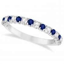 a white gold ring with blue sapphire stones