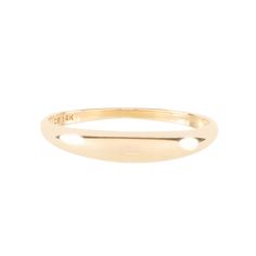 a yellow gold ring on a white background