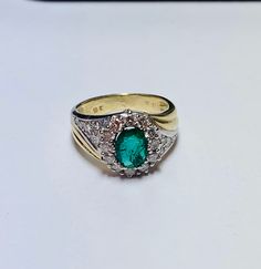 Beautiful Vintage 14k Yellow Gold Natural Oval Shape Emerald Ring 100% Natural Emeralds Emerald(s) 1.00CT Diamond: 0.80CT Color: G Clarity: SI1 Total ring weight: 5.2GR Ring sizing available free of charge For more information regarding this item feel free to reach me so I can accommodate your needs. Thank you Timeless Oval Emerald Ring Hallmarked, Timeless Oval Hallmarked Emerald Ring, Oval White Gold Signet Ring With Center Stone, Elegant Oval Hallmarked Signet Ring, Oval Green Signet Ring For Anniversary, Green Oval Signet Ring For Anniversary, Classic Oval Gemstone Ring, Fine Jewelry Hallmarked Oval Emerald Ring, Oval Hallmarked Emerald Ring Fine Jewelry