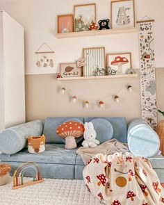 a living room filled with lots of furniture and decor on top of a wooden shelf