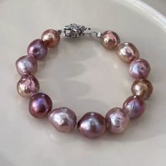 ad eBay - Shape: baroque. About Pearl. Q: Can I get my necklace or bracelet in a longer or shorter length?. We are jewelry wholesalers,Pearl,Gemstone,gold & silver jewellery. Match Necklace,Bracelet,Earrings,Rings sets. Elegant Purple Pearl Bracelet With Round Beads, Elegant Lavender Beaded Bracelets, Handmade Elegant Purple Pearl Bracelet, Elegant Handmade Purple Pearl Bracelet, Match Necklace, Rings Sets, Pearl Gemstone, Earrings Rings, South Seas