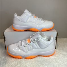 New Air Jordan 11 Low Citrus Size Womens 7.5 Color White, Bright Citrus White Leather Upper, Overlaid By A Tonal Patent Leather Mudgard, Bright Citrus Rubber Outsole, Phylon Midsole Provides Cushioning Brand New, Never Worn, With Original Box 100% Authentic White Custom Lace-up Sneakers With Air Cushioning, White Lace-up Custom Sneakers With Air Cushioning, White Low-top Basketball Shoes With Air Cushioning, Low-top Jordan Shoes With Air Cushioning And White Sole, White Sole Low-top Jordan Shoes With Air Cushioning, White Lace-up Basketball Shoes With Air Cushioning, White Lace-up Jordan Shoes With Air Cushioning, Jordan 1 Low Women, Jordan 1 Black Toe