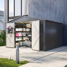 an outdoor storage shed with its doors open