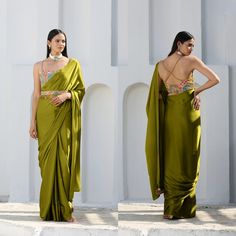 Experience the perfect blend of elegance and comfort with this exquisite Satin Silk saree, showcasing a captivating lime color and flat gold pendants. The lustrous satin weave imparts a glamorous touch, making it suitable for various occasions, such as Indian weddings, festivals, and parties. Complement it with one of our ready-made blouses for a stunning appearance. Delight in the convenience of a ready-to-wear saree with complimentary Fall & Pico, and savor the soft, draping material's unparalleled comfort. Preserve this piece's beauty with dry cleaning and steam or medium-heat ironing. ➛ Material: Crafted with premium quality Satin Silk material ➛ Comfortable: Exceptionally soft, draping smoothly over your skin and providing unmatched comfort ➛ Unique Lime Color: A playful yet elegant n Bollywood-style Draped Wedding Blouse Piece, Draped Blouse Piece With Zari Work For Diwali, Draped Art Silk Blouse Piece For Wedding, Semi-stitched Draped Blouse Piece With Pallu, Semi-stitched Draped Saree For Reception, Traditional Draped Dupatta With Pallu, Draped Dupatta With Pallu For Eid, Reception Saree With Cutdana Embroidery, Draped Saree With Unstitched Blouse For Diwali