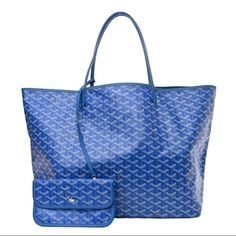 **New** Hard To Find Authentic Goyard St. Louis Pm Bag Tote! The Saint Louis Pm Bag Is Made From Goyardine And Is Unlined. It Is Extremely Light And Completely Reversible. Wear It Showing The Goyardine Fabric Or Inside Out, Showing The Linen And Cotton Mix. Its Two Leather Handles With Their Progressive Thickness Mean It Can Be Worn In Different Ways. It Has A Removable Inside Pocket Attached To One Of The Handles For Quick And Easy Access. The Bag's Exterior Shows The Iconic Chevron Monogrammed Luxury Blue Shoulder Bag For Daily Use, Luxury Blue Tote Shoulder Bag, Luxury Blue Shoulder Bag With Removable Pouch, Luxury Blue Tote Bag, Luxury Blue Shoulder Bag For Shopping, Luxury Blue Shoulder Bag For Everyday Use, Blue Shoulder Bag For Shopping With Dust Bag, Goyard St Louis Pm, Goyard Saint Louis Pm