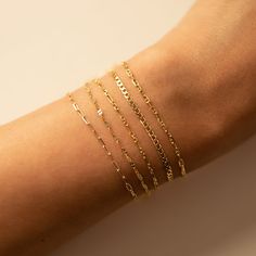 Dainty and masculine, this Gucci Marina Italian chain has an intricate link design. Perfect accessory to stack bracelets. 14K Solid Gold Italian Gucci Marina chain, width 1.5mm Length options in pull-down menu Handcrafted in NYC Hypoallergenic, lead and nickel free #BS029 Dainty Gold Plated Bracelet With Figaro Chain, 14k Gold Figaro Chain Bracelet With Rectangular Links, Dainty Gold-plated Bracelet With Figaro Chain, 14k Gold Figaro Chain Link Bracelet, Gold Link Bracelets With Figaro Chain, Adjustable Yellow Gold Bracelet With Figaro Chain, Gold Figaro Chain Link Bracelets, 14k Gold Figaro Chain Link Bracelets, 14k Gold Figaro Link Bracelets