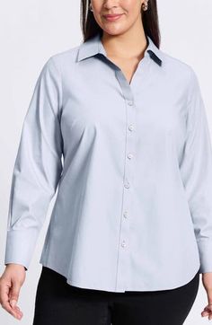 A wardrobe-staple shirt is tailored from breathable, wrinkle-resistant cotton and finished with a curved hem. 28" length Front button closure Spread collar Long sleeves with button cuffs Wrinkle resistant 100% cotton Machine wash, tumble dry Imported Wrinkle-resistant Button-up Office Shirt, Wrinkle-resistant Office Button-up Shirt, Business Casual Wrinkle-resistant Button-up Tops, Wrinkle-resistant Long Sleeve Business Casual Tops, Long Sleeve Wrinkle-resistant Tops For Business Casual, Classic Wrinkle-resistant Tops For Business Casual, Wrinkle-resistant Long Sleeve Tops For Business Casual, Wrinkle-resistant Relaxed Fit Shirt For Work, Wrinkle-resistant Relaxed Fit Work Shirt