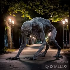 an animal statue is standing on its hind legs in the middle of a park at night