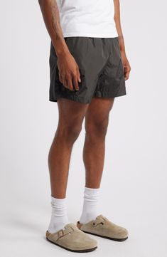 Get active and stay comfortable in these comfortably lightweight shorts ideal for the gym, sport court or a jog along the beach. Elastic/drawstring waist Front slant pockets Lined 100% ECONYL® regenerated nylon ECONYL regenerated nylon is made with recovered nylon waste, such as fishing nets and fabric scraps Machine wash, tumble dry Imported Sporty Bottoms With Relaxed Fit And Functional Drawstring, Sporty Bottoms With Functional Drawstring And Relaxed Fit, Sporty Gym Bottoms For Summer, Nylon Sportswear Bottoms With Drawstring, Nylon Athletic Shorts With Functional Drawstring, Nylon Sports Activewear With Drawstring, Sports Activewear With Drawstring In Nylon, Nylon Activewear With Drawstring For Sports, Nylon Drawstring Activewear For Sports