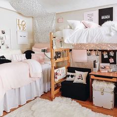 a bedroom with bunk beds and white sheets