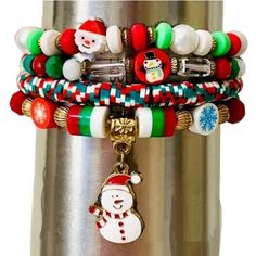 These Festive Christmas Bracelets Add Holiday Cheer With Every Jingle. Perfect For The Person Whose Spirit Animal Is A Snowman Or Santa. Enjoy The Stretchy Comfort And Just Be Careful Not To Frighten The Cat With All The Charm Dangling. Christmas Themed Stackable Bracelets, Set Of 4 Size: Os, Bracelets Have A Circumference Of Approximately 6.8 Inches When Unstretched. Condition: New Set Of 4 Bracelets Christmas-Themed Beads Snowman And Santa Charms Stretchy Elastic Fit Multicolor Design: Red, Wh Bohemian Jewelry For Christmas Holiday, Bohemian Jewelry For Christmas, Bohemian Christmas Holiday Jewelry, Adjustable Colorful Beaded Bracelets For Christmas, Beaded Jewelry For Christmas Holiday, Red Christmas Bracelets For The Holidays, Red Christmas Bracelets For Holiday, Red Christmas Bracelet For Holiday, Red Beaded Bracelets With Colorful Beads For Christmas