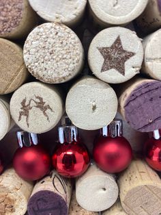 several wine corks with christmas ornaments on them