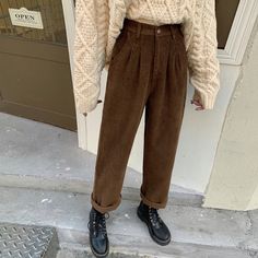 High waisted corduroy pants with a straight leg fit and pleated details. Button and zip front with belt loops, side pockets and an elastic back. Cut open button hole with scissors. S: 22”-27" waist, 13” rise, 37” hips, 24” thighs, 19” ankles, 26" inseam M: 23.5"-29" waist, 13" rise, 38.5" hips, 25” thighs, 20” ankles, 26" inseam L: 25"-30" waist, 13" rise, 40" hips, 26” thighs, 21” ankles, 26" inseam Korean Pants, Black Korean, Corduroy Pants Women, Warm Pants, Loose Trousers, Brown Pants, Straight Trousers, Fleece Pants, 가을 패션