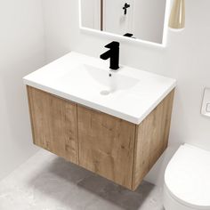 a bathroom with a sink, toilet and mirror