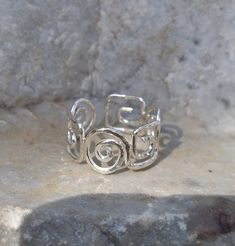 "✧ Greek key and spiral combo hammered ring in Sterling silver by BIOS jewelry ✧ ◆ This delicate adjustable ring handmade with care in our workshop in Greece, features the Meander or Greek key motifand spiral two of the most beautiful and important symbols in Ancient Greece. ◆ The continuous interlocking lines and repeated motif reflects the fluid movement of the ocean wave, and thus the eternal flow of things, the meandering of life. ≈ Greek key symbolizes ◆ Unity ◆ Infinity ◆ Everlasting bonds Adjustable Rings Silver, Cool Silver Rings, Spiral Jewelry, Artsy Jewelry, Flat Ring, Fluid Movement, Hammered Jewelry, Pewter Jewelry, Spiral Ring