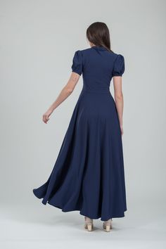 Beautiful navy blue dress made from soft suiting fabric. This evening formal gown has chic fit and flare silhouette, short bell sleeves, bow tie on the neck and side seam pockets, invisible zipper in side seam. Sleeve length 23 centimeters (9 inches). Can be made in plus sizes, junior bridesmaids and in maternity style. If measurements don`t match any size in my chart, I highly recommend a custom fit. Visit my FAQ section for required measurements. Model wears size US 8, she is 180 cm tall. Plea Chic Fitted A-line Maxi Dress, Fitted A-line Prom Evening Dress, Fitted A-line Prom Gown, Blue Fitted A-line Bridesmaid Dress, Formal Fitted A-line Gown, Fitted A-line Gown For Formal Occasions, Fitted A-line Silhouette Gown For Formal Events, Fitted A-line Bridesmaid Dress For Evening, Classic Fitted Prom Evening Dress