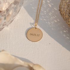 "Think of the statement that you wish to make as our 14K gold filled disk is large enough to engrave up to 9 letters - so you can opt for a name, initials, or even a word that holds great meaning for you. Simple and uncomplicated, the shiny-finish pendant hangs from a delicate chain in matching gold that comes in your choice of 16, 18, or 20-inch lengths. Free Engraving for a limited time! NECKLACE DETAILS ⚬ 14k gold-filled disk and chain. ⚬ Disk measures 3/4\" (19mm). ⚬ Chain in your choice of Time Necklace, Gold Disc Necklace, Gold Letter Necklace, In Cursive, Gold Filled Hoops, Necklace Initial, Gold Name Necklace, Initial Necklace Gold, Gold Disc