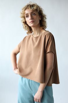 Oversize modal blouse. Cropped front, loose sleeves.   - Oversize fit style blouse  - Round neckline - Short loose kimono style sleeves - Handmade by our family Relaxed Batwing Sleeve Summer Tops, Chic Boxy Cropped Top, Effortless Relaxed Fit Crop Top, Oversized Brown Blouse For Summer, Oversized Short Sleeve Crop Top For Summer, Chic Boxy Summer Tops, Effortless Viscose Summer Tops, Boxy Short Sleeve Blouse For Spring, Effortless Summer Viscose Top