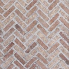 a brown and white herringbone tile pattern