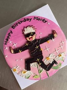 a birthday cake that is decorated to look like a man