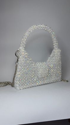 Crystal purse for special occasions such as wedding & baptism, parties.  Made of Crystal Glass. Size 23 x 21 x 4 cm (with decorative handle) chain can be adjusted 100 cm or 120 cm Fits iPhone 13 Pro and many other small things as money, card, keys, lipstick, mirror  In iridescent colour ✨showing luminous colours that seem to change when seen from different angles. Crystal Purse, Pearl Bag, Luminous Colours, Purse, Clutch Handbag, Evening Bags, Crystal Beads, Purses And Handbags, Special Occasion